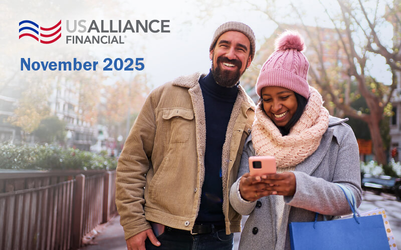 A couple go holiday shopping together with the "USALLIANCE Logo on top, and the words November 2025."